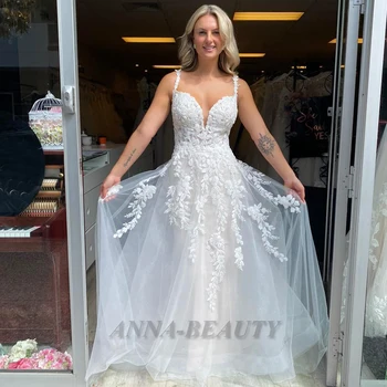 Свадебное платье из блестящего тюля 