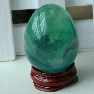 Зеленое флюоритовое яйцо в горошек, кристалл антозонита + подставка